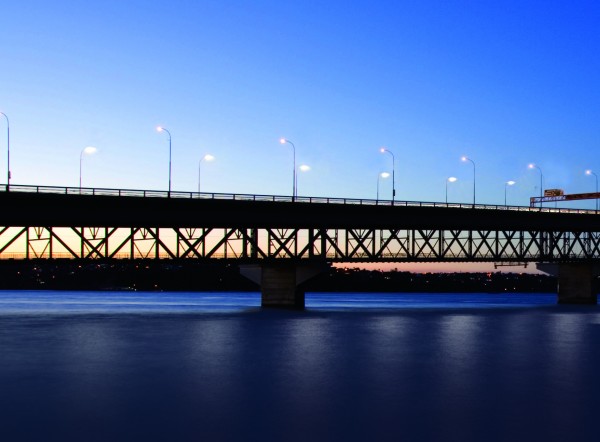 This photo shows the bridge as it is currently lit with sodium lights